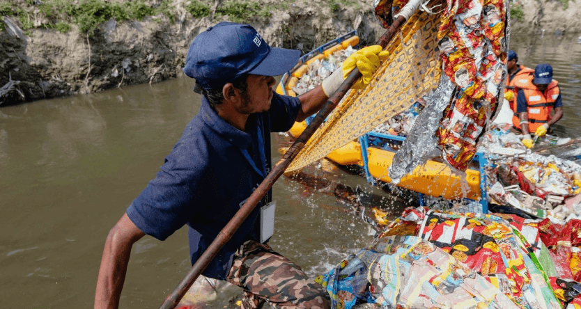 person working on plastic removal